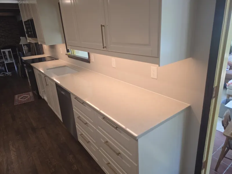 Light quartz galley countertop with brass hardware – Beltway Countertops, Northern Virginia