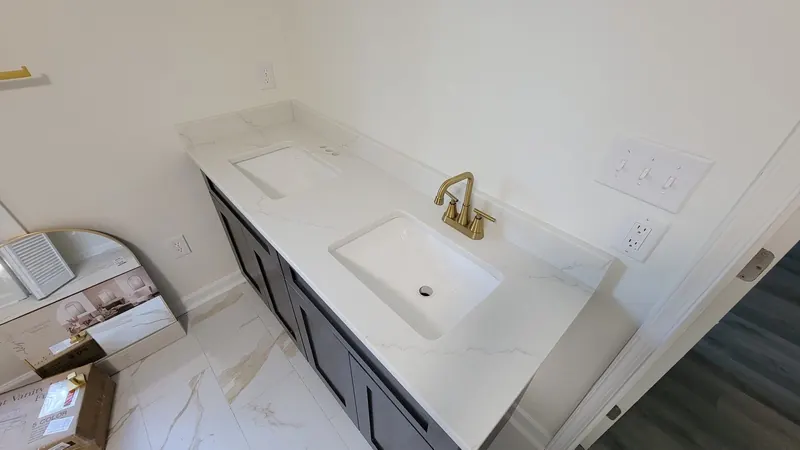White marble-look double vanity top in a bathroom – Beltway Countertops, Northern Virginia